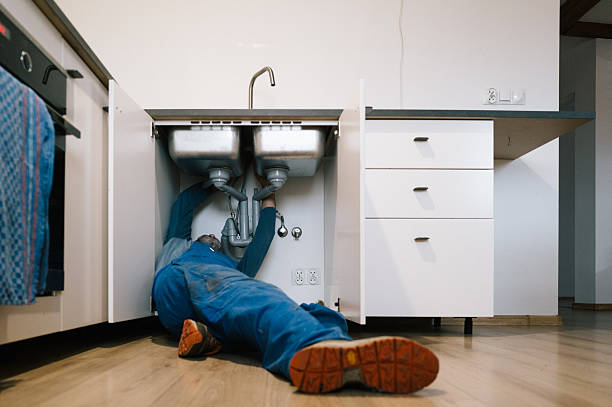 Professional Plumbing technician working in Round Mountain, NV